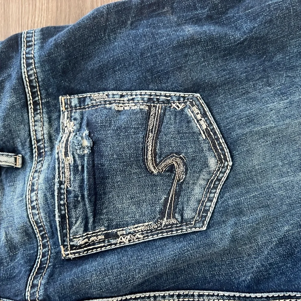 Silver Jeans Women's Straight Leg Dark Blue Distressed Jeans